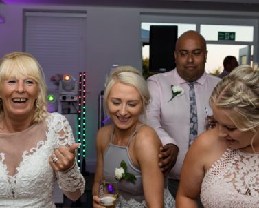 Bride and bridesmaids enjoying their moment with Wedding DJ Cornwall supplying our Unique VW DJ booth.