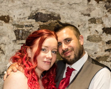 The couple big smiles enjoying the moment with Wedding DJ Cornwall in Bodmin Jail.